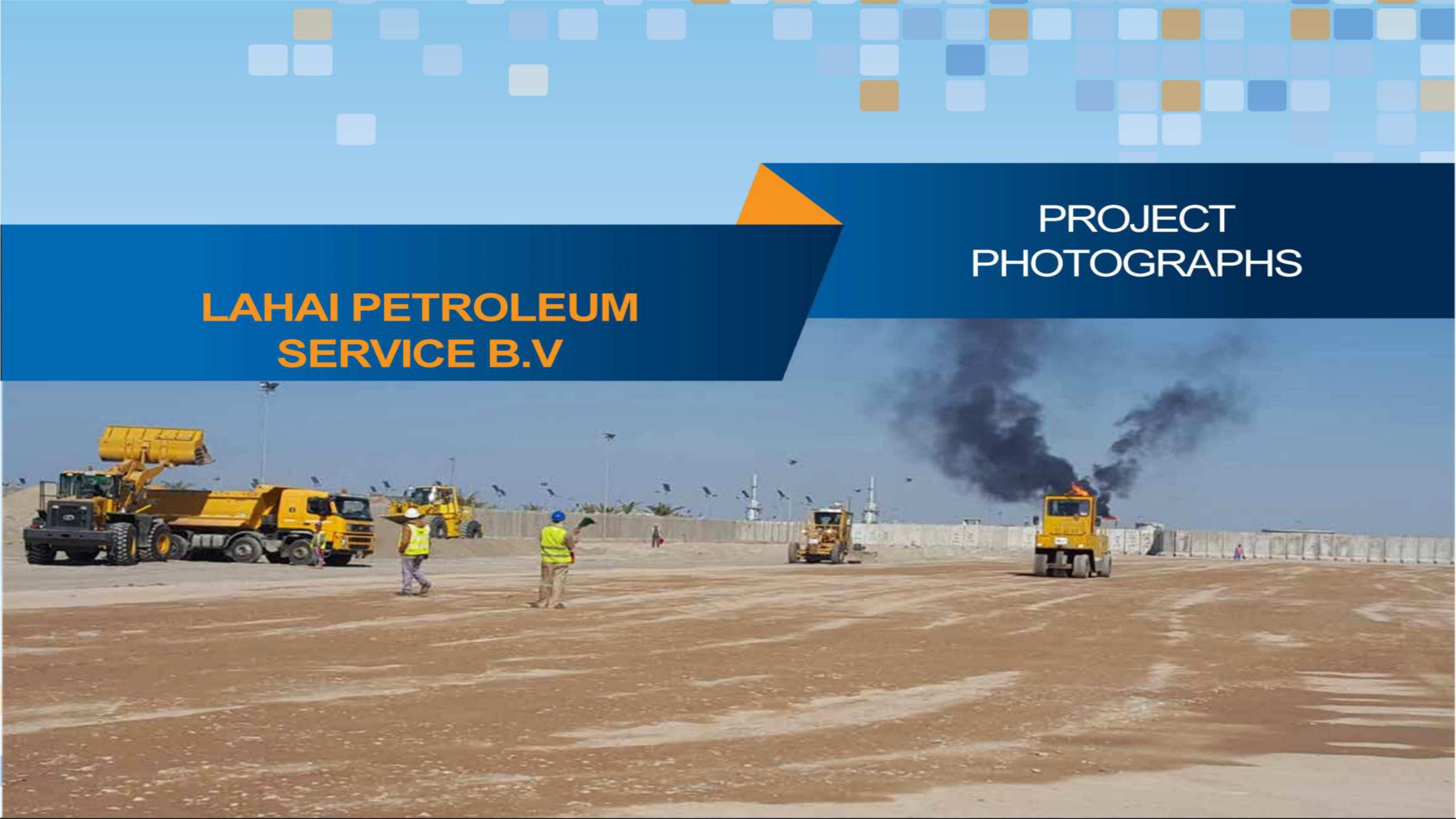 LAHAI oil field operations — Heavy equipment and workers on active oil field site in southern Iraq